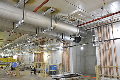 A view of cryo line installation in the tunnel.