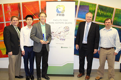FRIB hosted a special recognition event to honor the MSU College of Engineering’s support of FRIB. Pictured, from left, are College of Engineering Dean Leo Kempel, FRIB graduate student Di Kang, Professor Thomas Bieler of the Department of Chemical Engineering and Materials Science, FRIB Laboratory Director Thomas Glasmacher, and FRIB Cavity Fabrication Group Leader Chris Compton. 