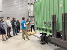 FRIB Outreach Coordinator Zach Constan gives a tour of FRIB to the Muskegon Community College STEM Club.