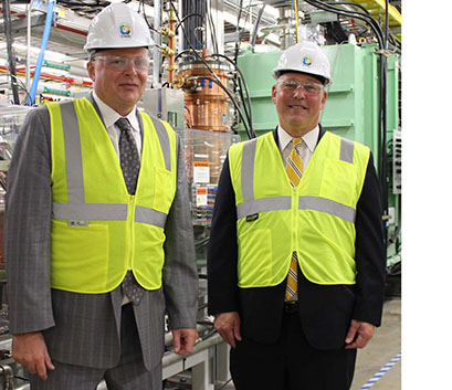On 16 July, Dr. Chris Fall, principal deputy director of the U.S. Department of Energy’s Advanced Research Projects Agency-Energy, (right) visited FRIB, and FRIB Laboratory Director Thomas Glasmacher (left) provided a tour of the superconducting linear accelerator.