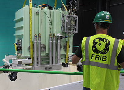 FRIB Project personnel placed the first and only β=0.085 matching cryomodule in the linear accelerator tunnel on 17 July. 