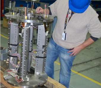 At Brookhaven National Laboratory, the complete set of HTS coils are assembled for testing at 77 K (about -320 degrees Fahrenheit) which will complete R & D.
