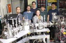 Researchers stand behind the Resonant ionization Spectroscopy Experiments (RiSE).